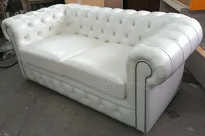 White Chesterfield Two Seater Loveseat With Button Tufting