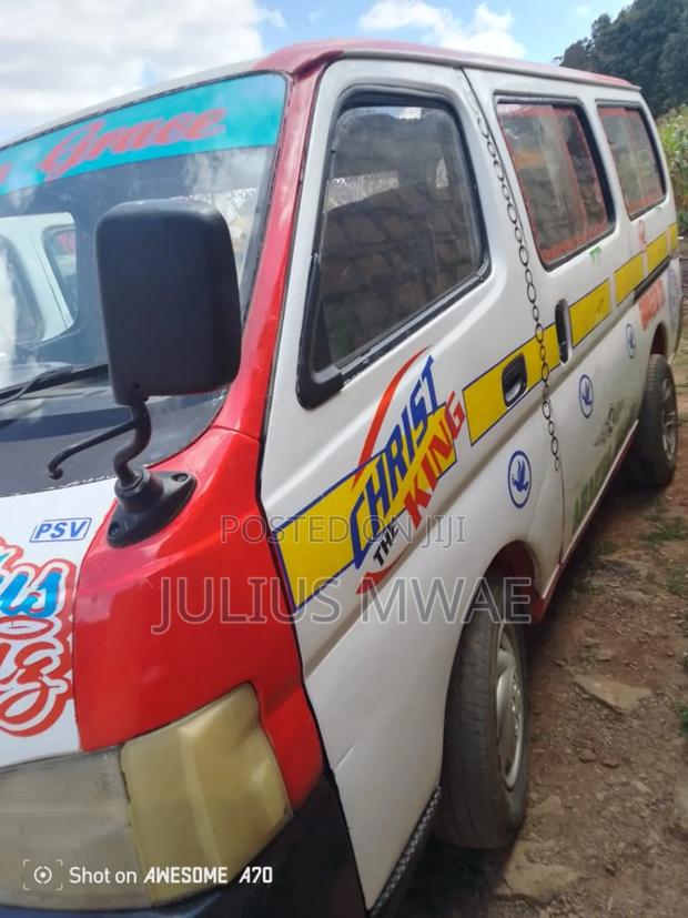 Nissan Caravan (Urvan) 2009 White - thumbnail 4