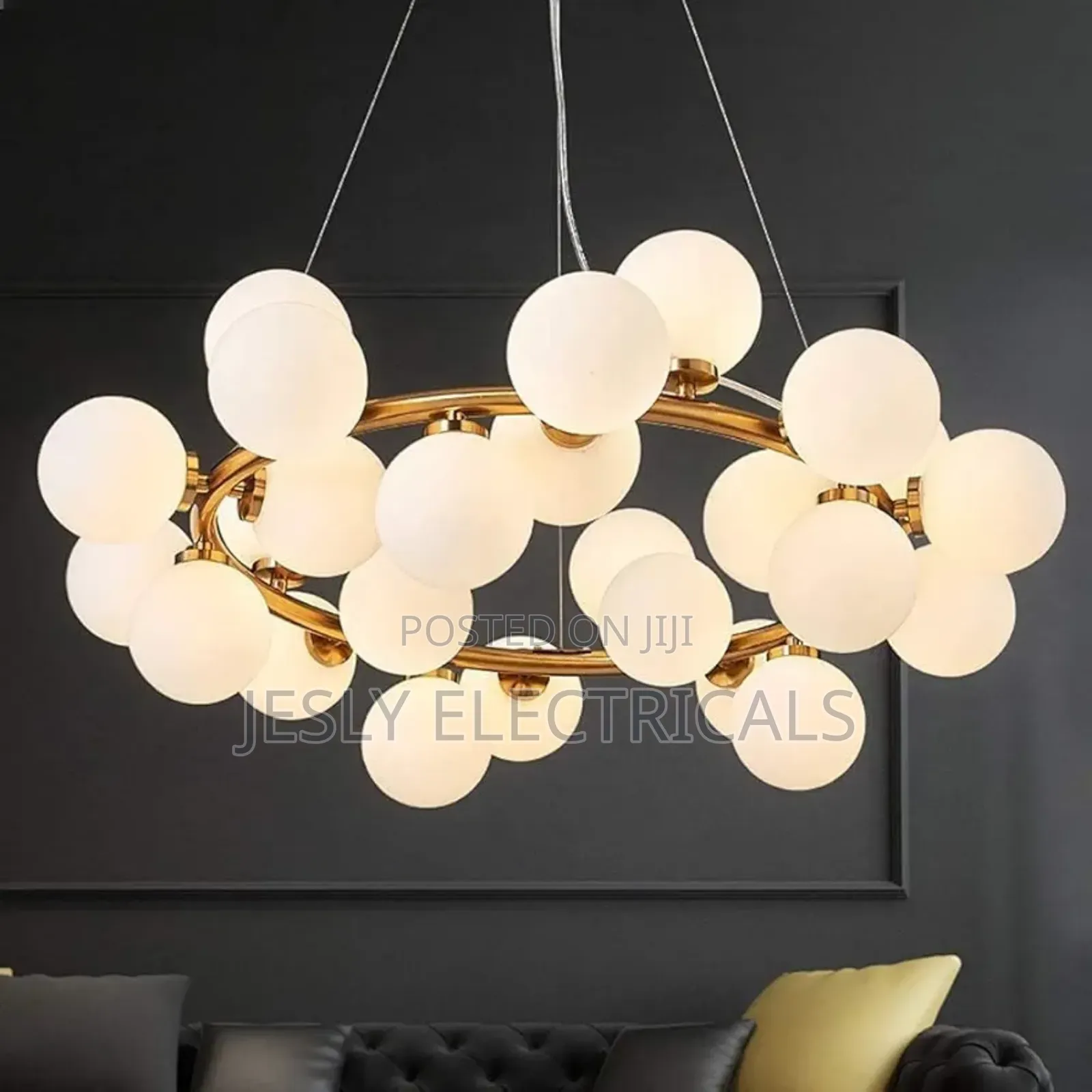 Modern Chandelier With Multiple Spherical, Glowing Bulbs