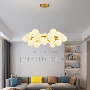 Modern Chandelier With Multiple Spherical, Glowing Bulbs
