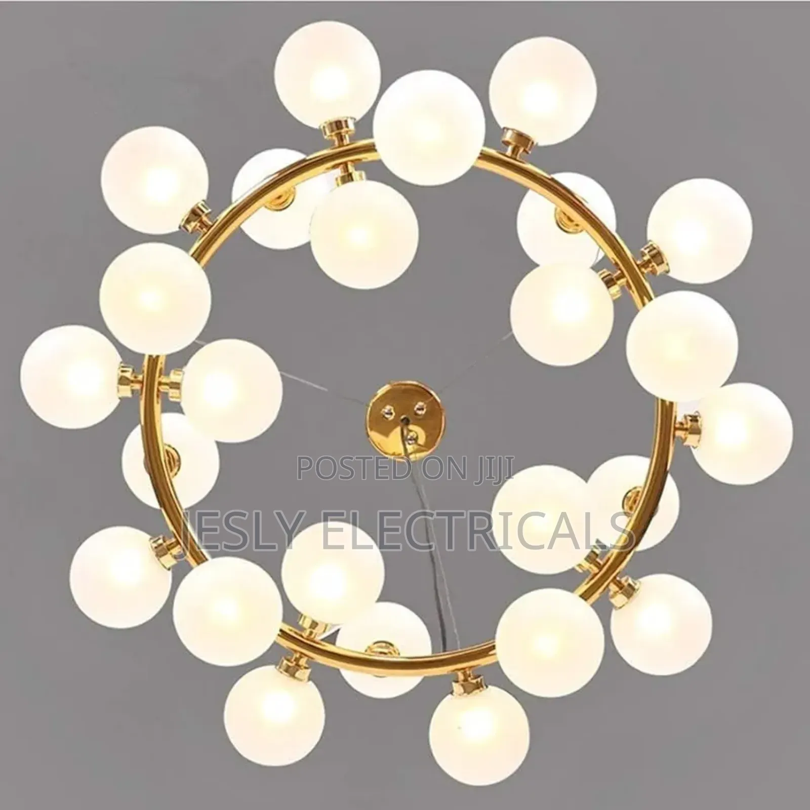 Modern Chandelier With Multiple Spherical, Glowing Bulbs