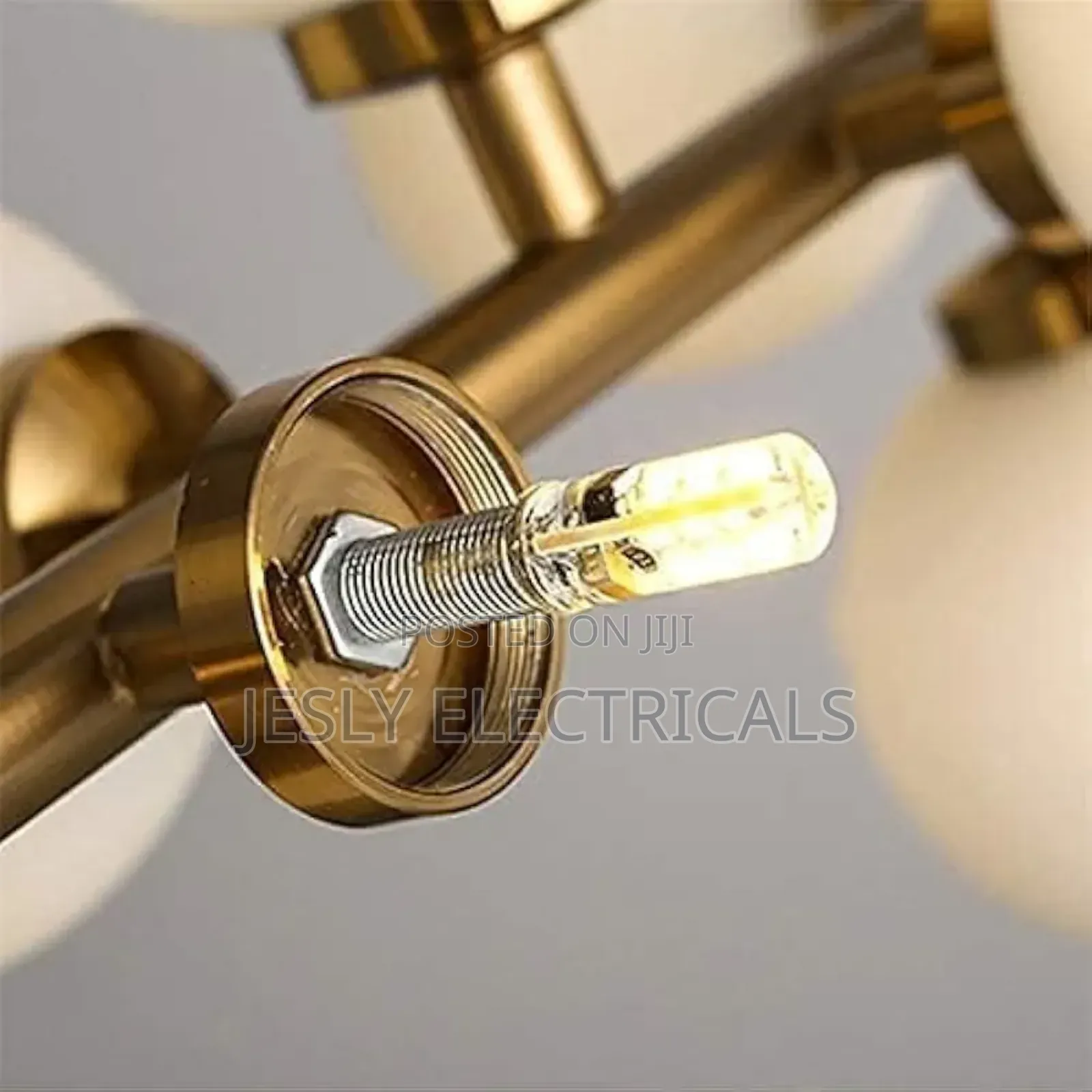 Modern Chandelier With Multiple Spherical, Glowing Bulbs