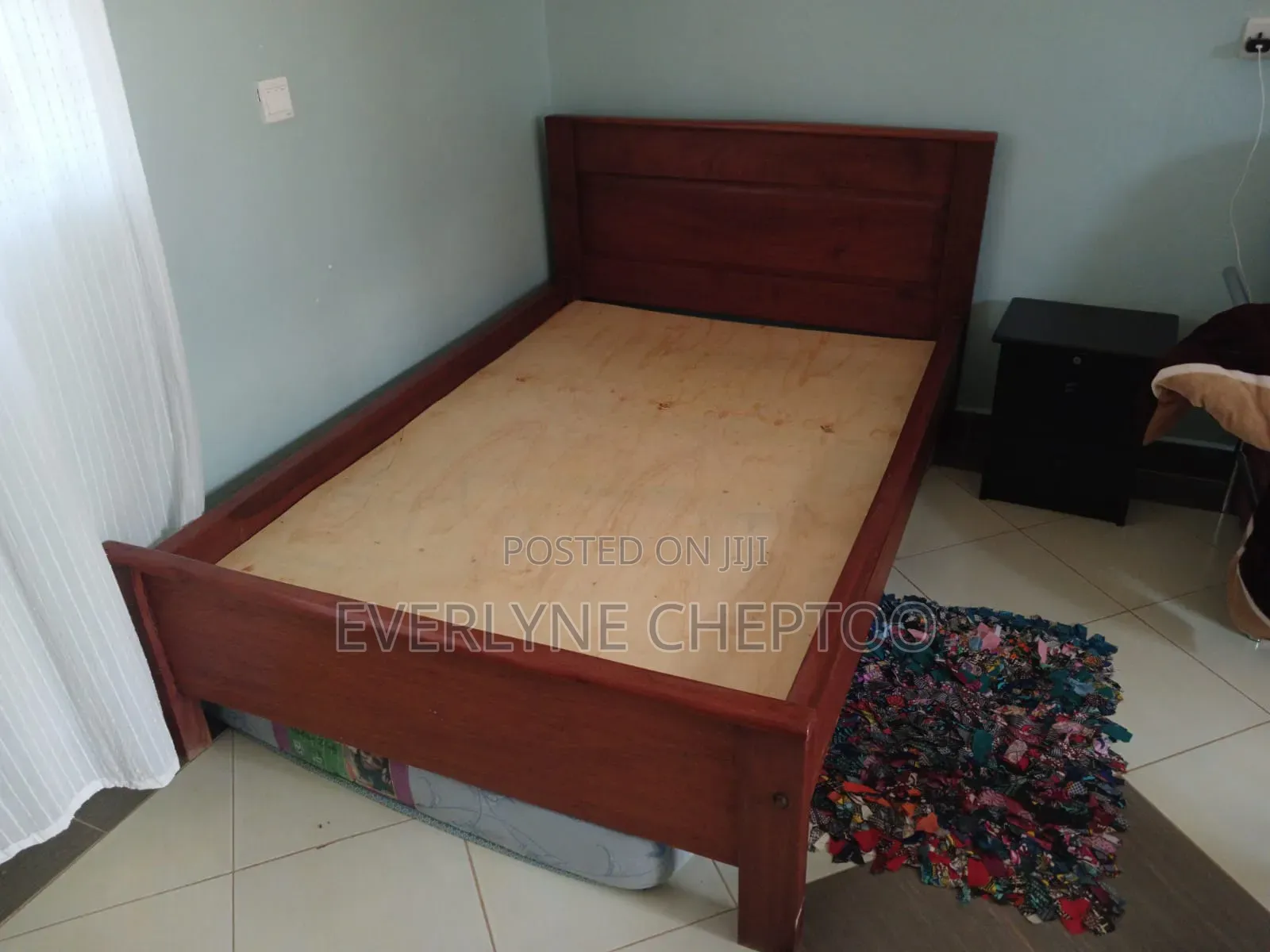 4 by 6 Light Brown Wooden Mahogany Bed