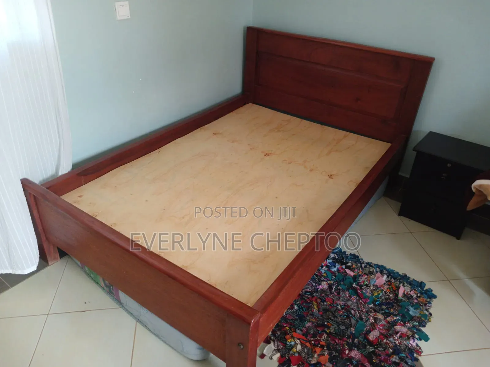 4 by 6 Light Brown Wooden Mahogany Bed
