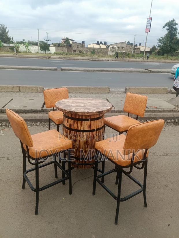 Bar Set, 4 Chairs and a Barrel Round Table