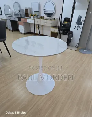 Round Pedestal Table