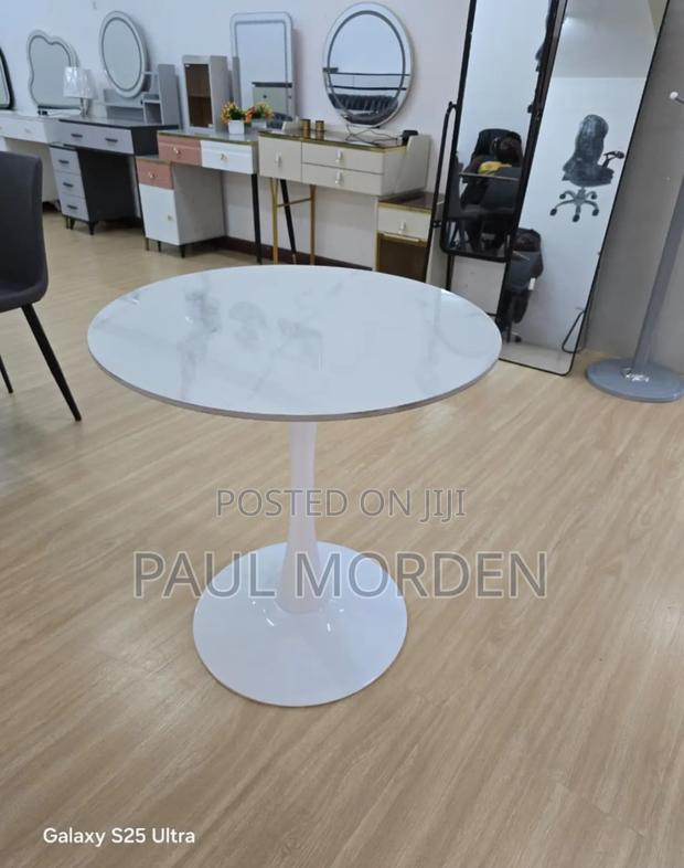 Round Pedestal Table