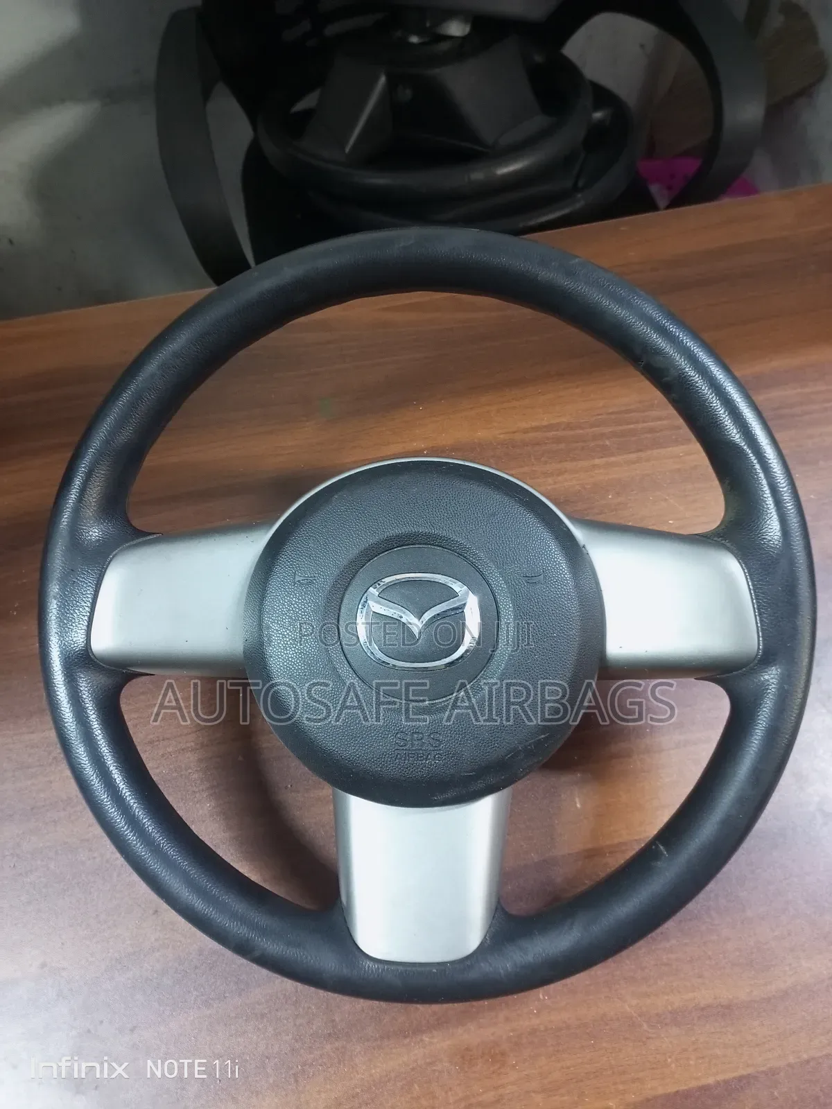 Mazda Demio Steering Wheel