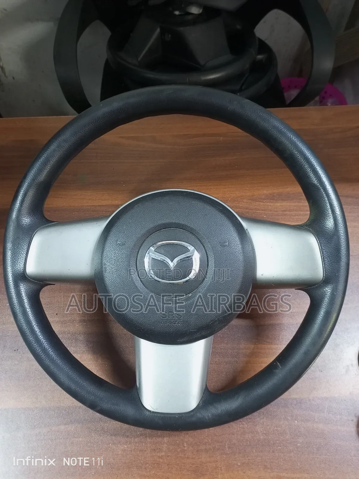 Mazda Demio Steering Wheel
