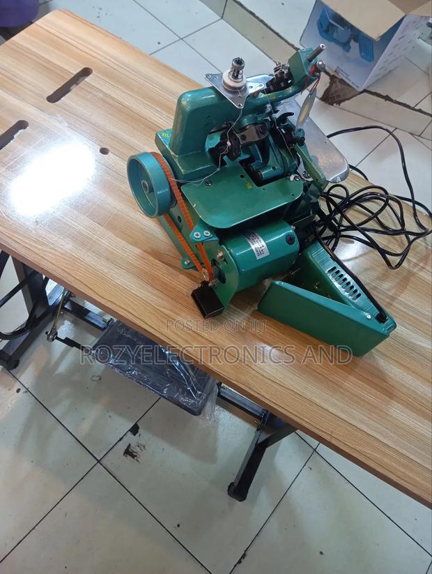 Complete Overlock Machine With Table and Motor - main view