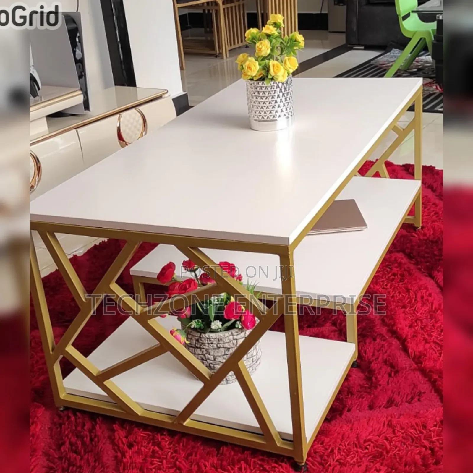 White Zippy Elegant Coffee Table With Golden Legs 