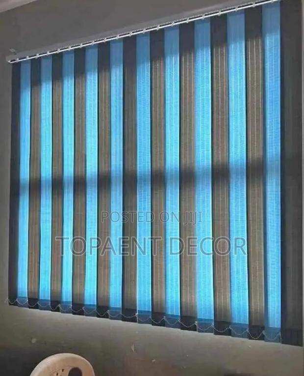 Grey and Sky Blue Mix Serenity Behind Every Slat Vertical Office Blind