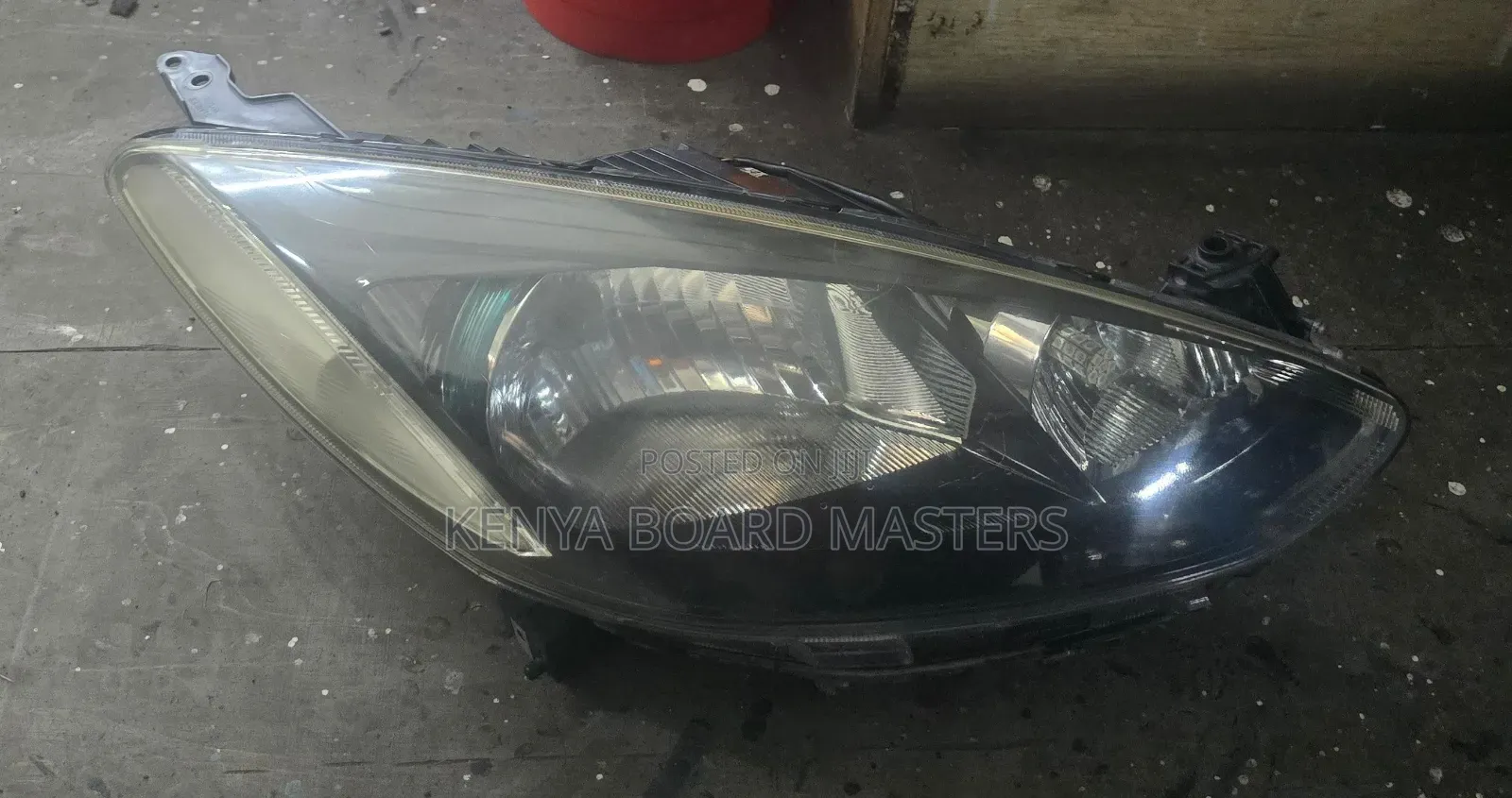Mazda Demio 2012 None Xenon Blue Headlight