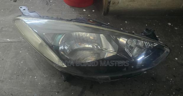 Mazda Demio 2012 None Xenon Blue Headlight