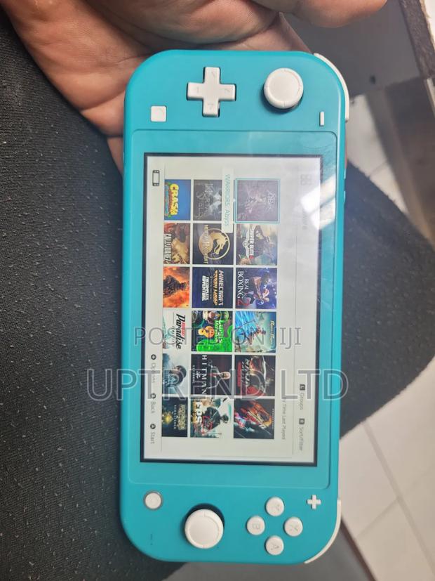 Blue Nintendo Switch Lite Chipped With 20 Games - main view