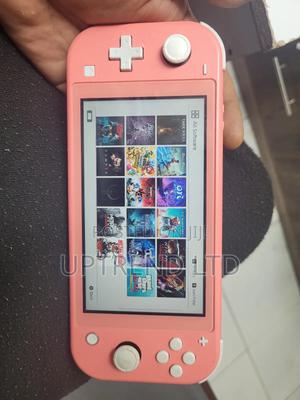 Pink Nintendo Switch Lite Chipped With 20 Games 256gb - thumbnail 2