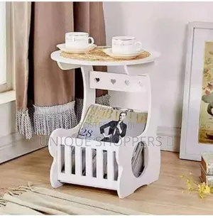 White Round Magazine Table With PVC Mat
