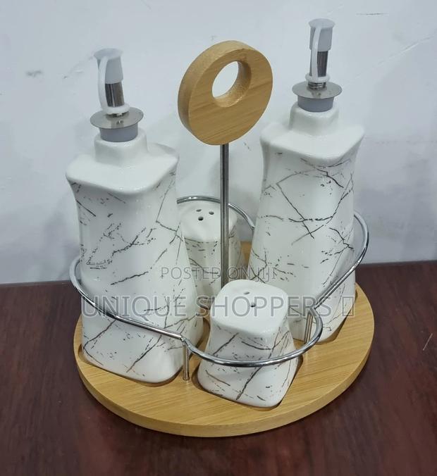 4 Ceramic Gravy Boat Season Oil Dispenser and Shakers on Bamboo Base