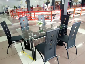 Executive 6 Sitter Glass Dinning Table  With Leather Seat