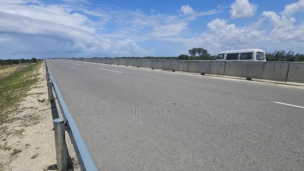 Plots in Dongo Kundu 50×100 , Right on the Highway - main view