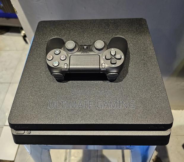 Playstation 4 Slim With 10games - thumbnail 3