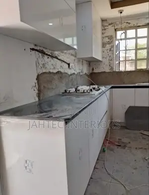 Kitchen Cabinets Installing and Granite Fixing