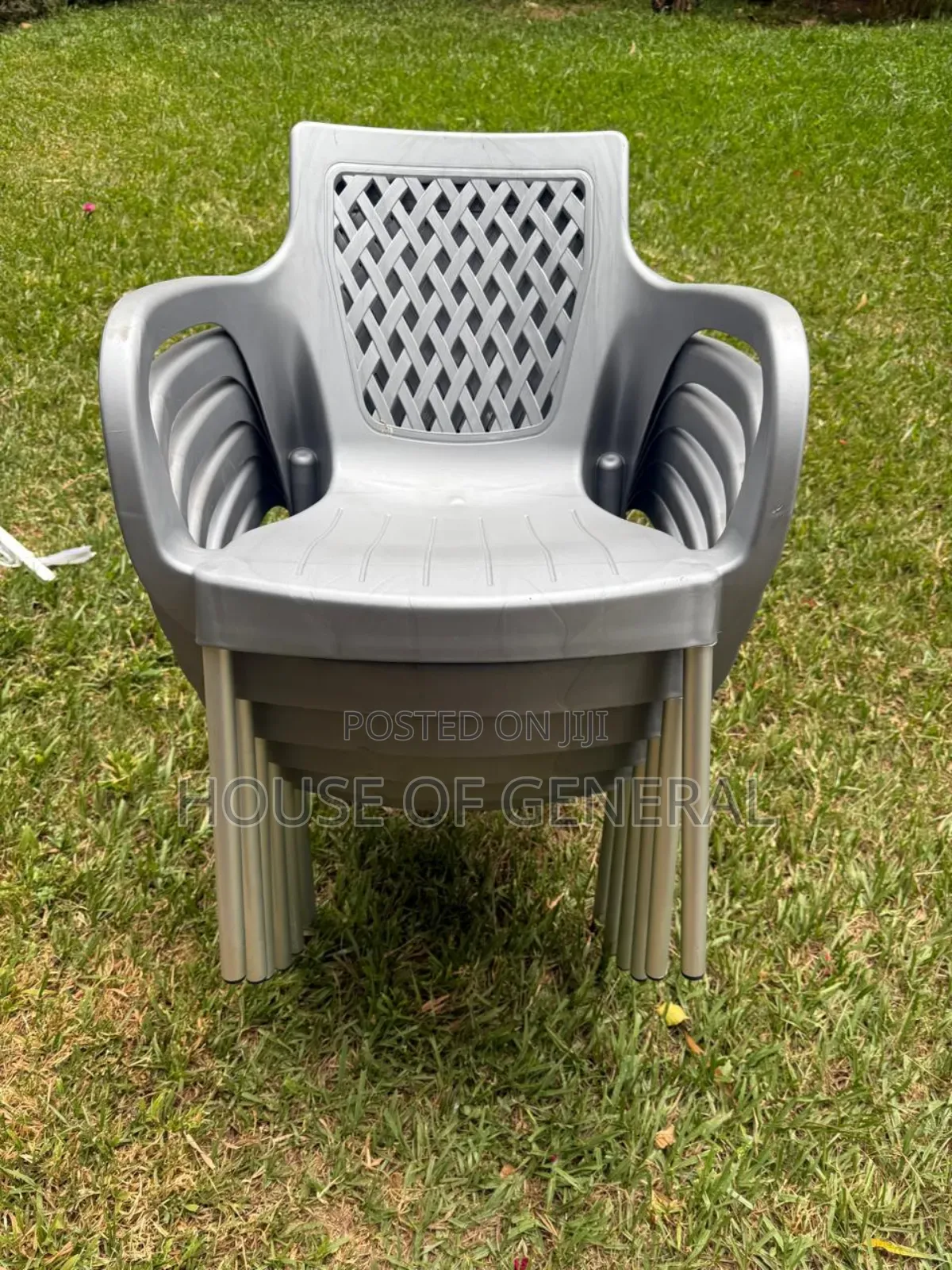 Gray Armed Plastic Chairs With Metal Legs. Strong and Durable Chair