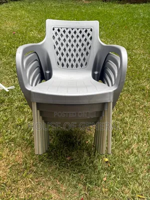 Gray Armed Plastic Chairs With Metal Legs. Strong and Durable Chair