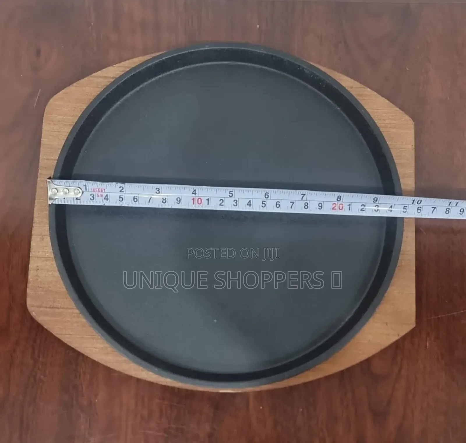 Cast Iron Hot Sizzling Plate on Wooden Tray