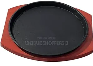 Cast Iron Hot Sizzling Plate on Wooden Tray