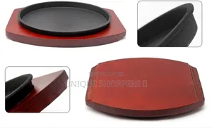 Cast Iron Hot Sizzling Plate on Wooden Tray