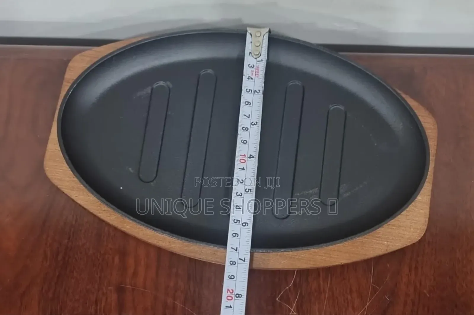 Cast Iron Hot Sizzling Plate on Wooden Tray