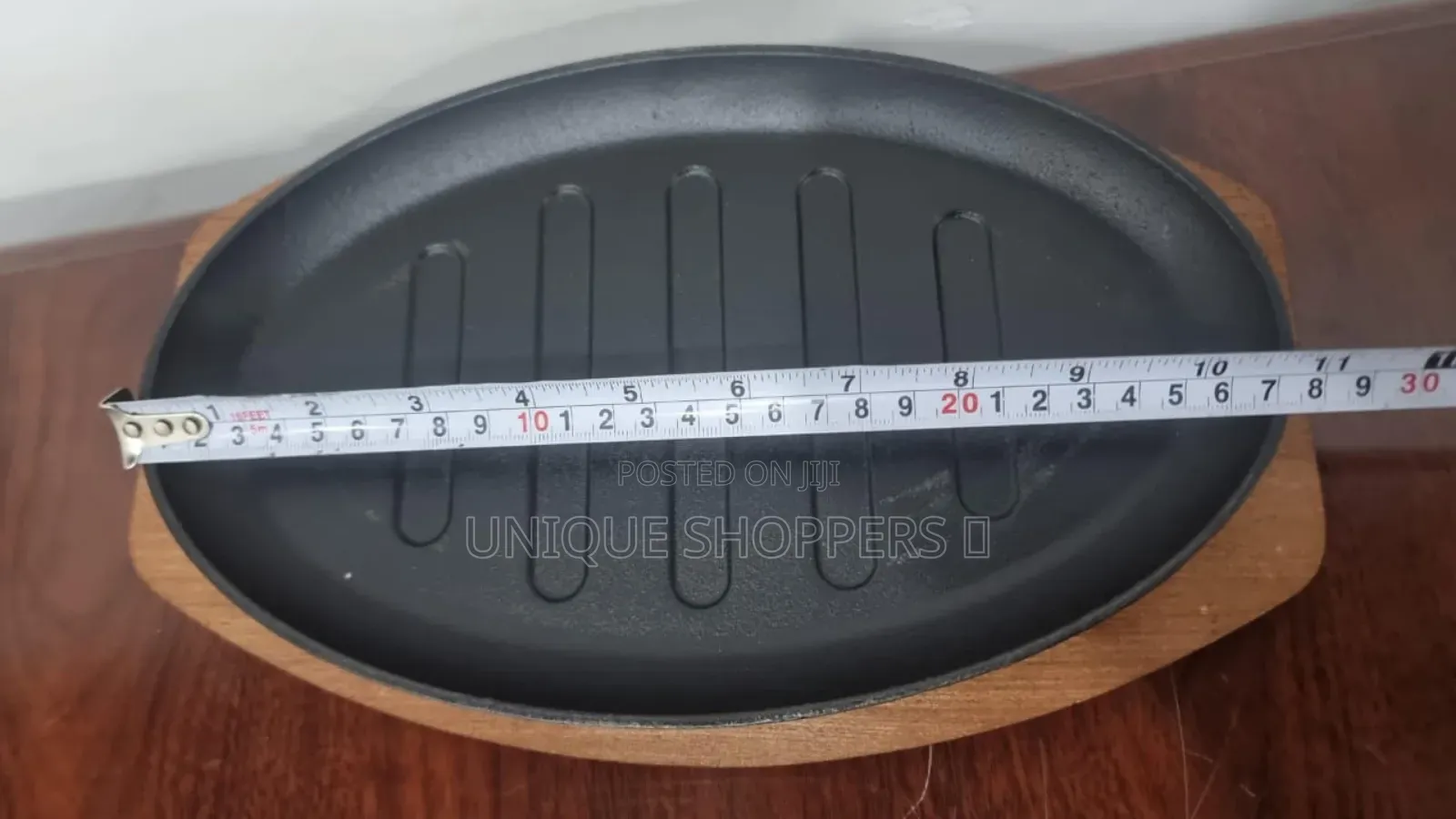 Cast Iron Hot Sizzling Plate on Wooden Tray