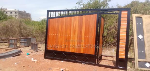 Modern Sliding Wooden-Finish Steel Gate - main view