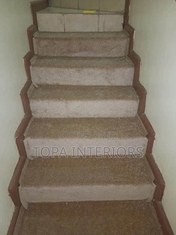 Home Beige Stairs Wall to Wall Carpets Installation to Prevent Slips
