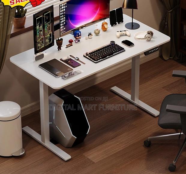 Office Desk: Higher and Higher Standing Office Desk