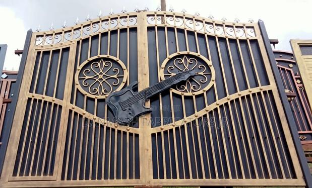 Decorative Black Gold Gate With Guitar Art - main view