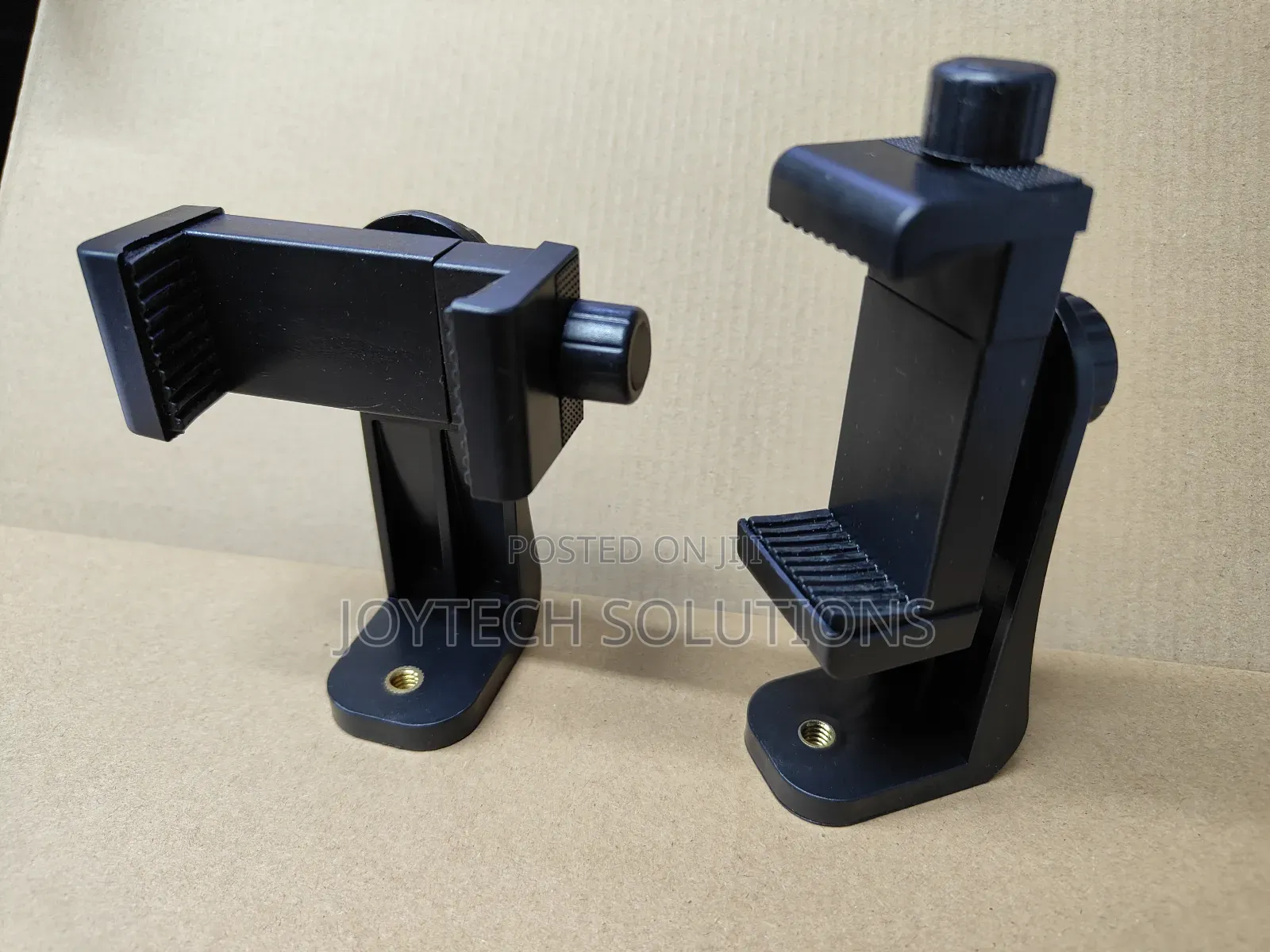 Universal Tripod Phone Holder. ( Portrait and Landscape Enabled)