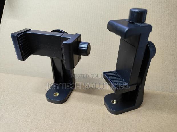 Universal Tripod Phone Holder. ( Portrait and Landscape Enabled)