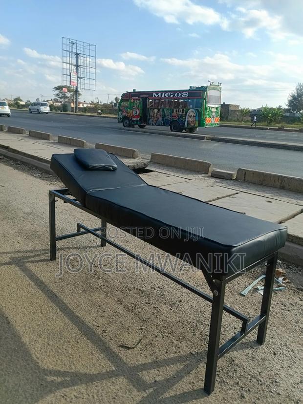 Foldable Black Massage Bed With Waterproof Cover. - main view