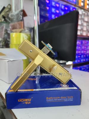 Bathroom Door Lock ( Gold) Moment - thumbnail 2