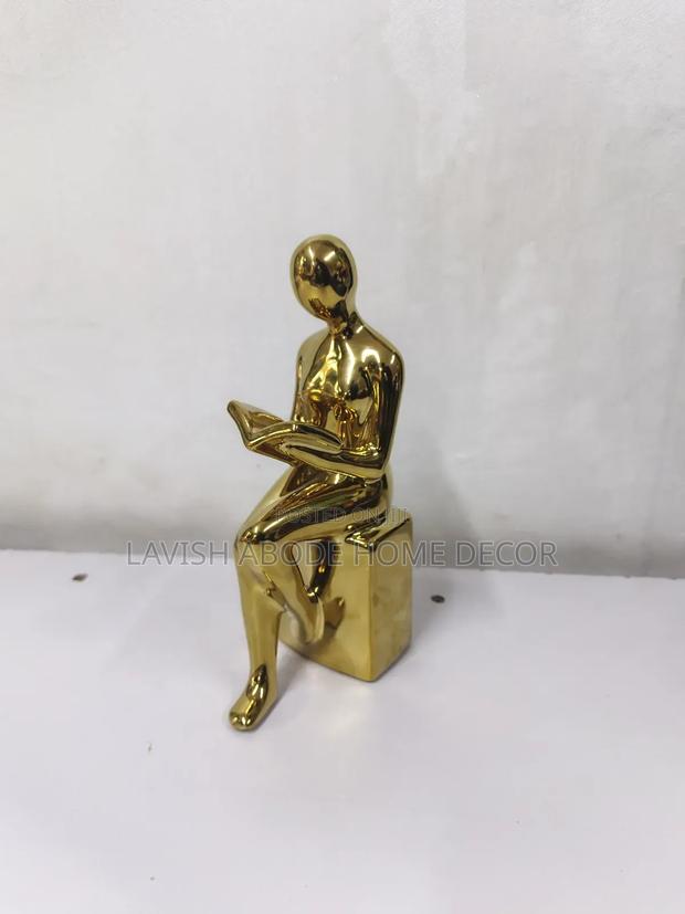 Gold Sitting Reading Woman Statue - main view