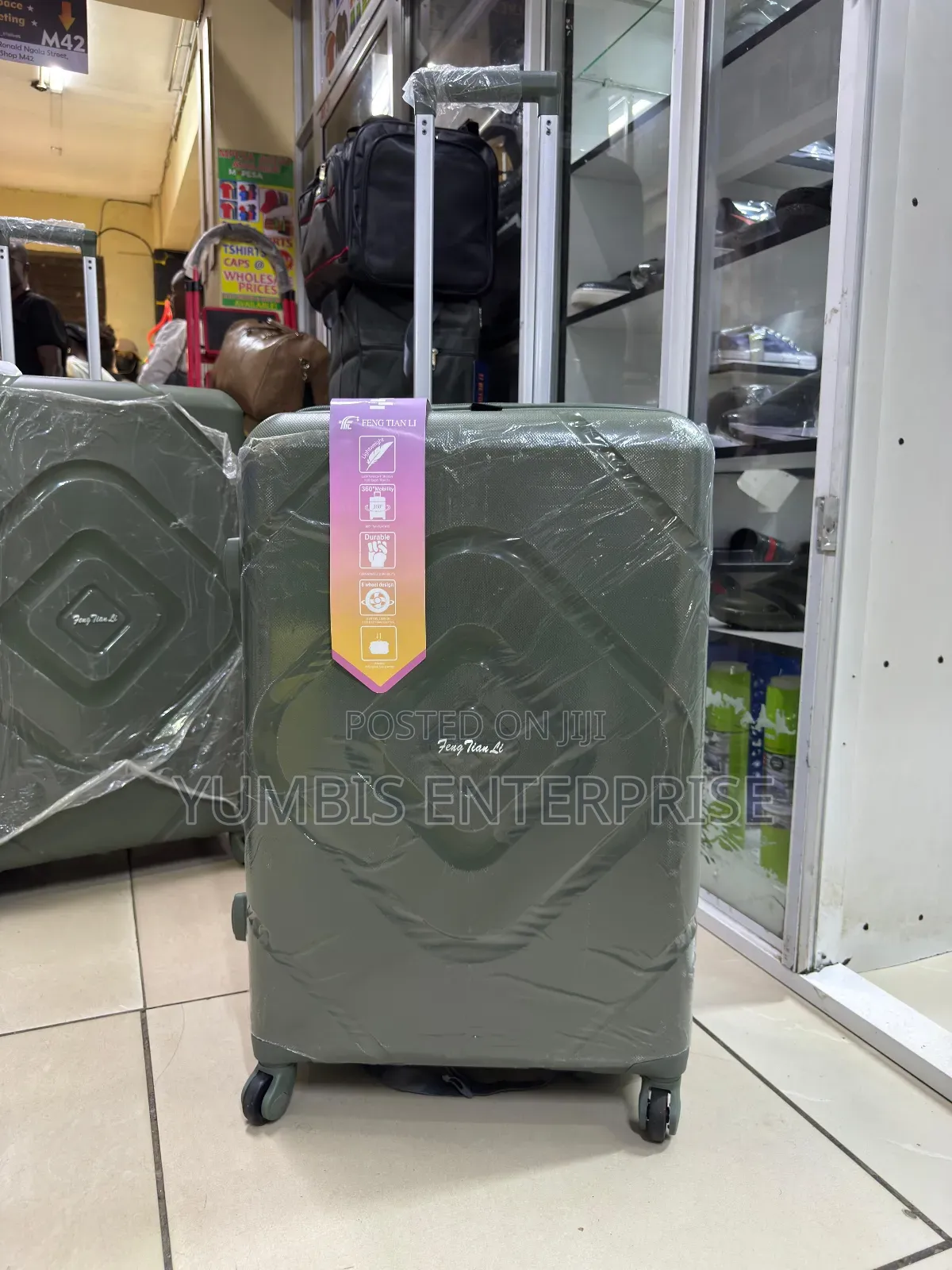 Medium Jungle Green Suitcase Rubber Height 69cm