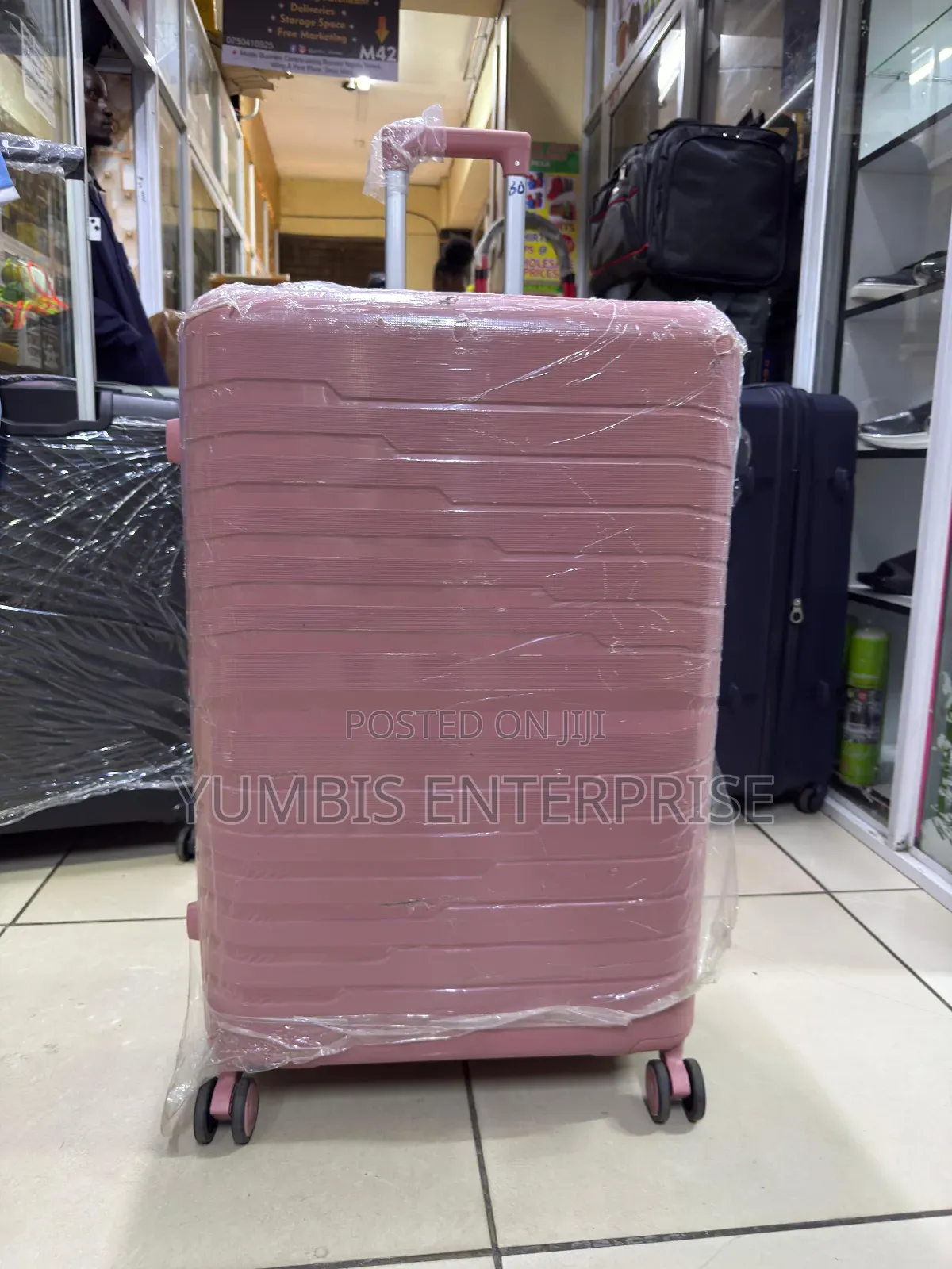 Pink Rubber Suitcase Xl Size (32kgs) at 4500