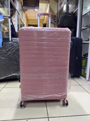 Pink Rubber Suitcase Xl Size (32kgs) at 4500