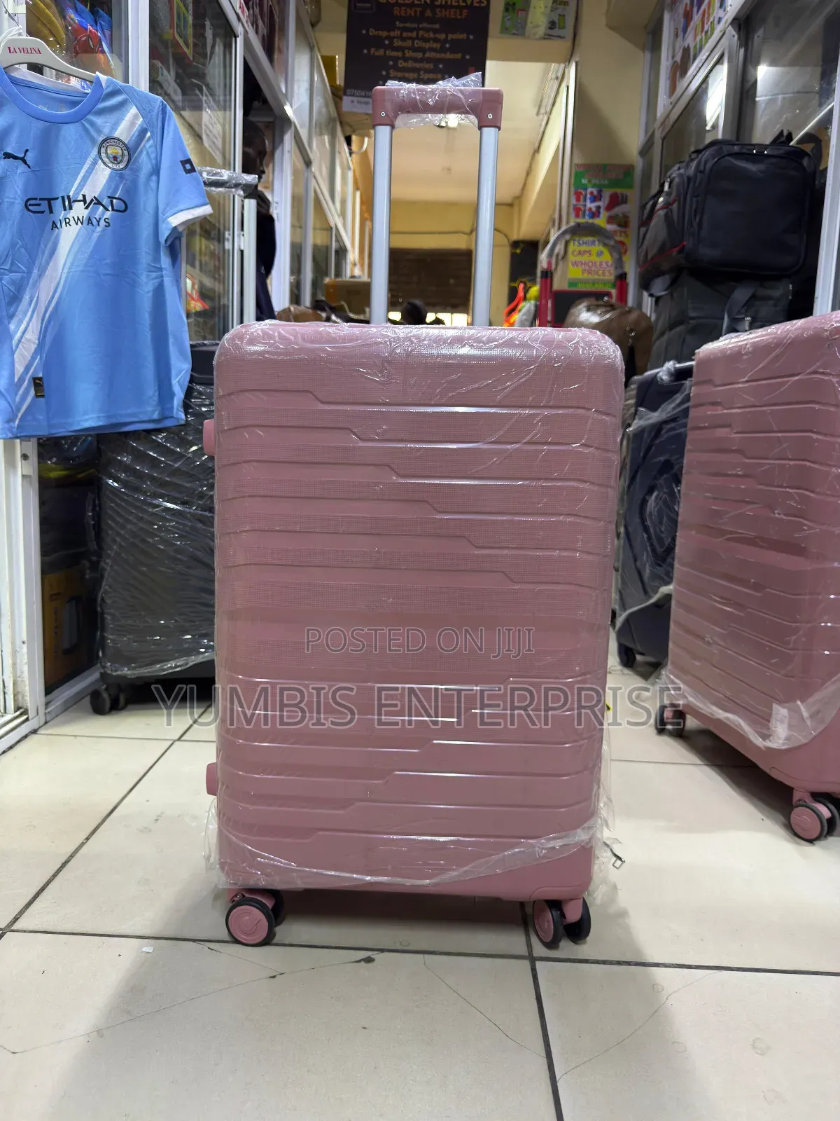 Medium Size Rubber Suitcase Pink 20kgs at 3000 Height 69cm
