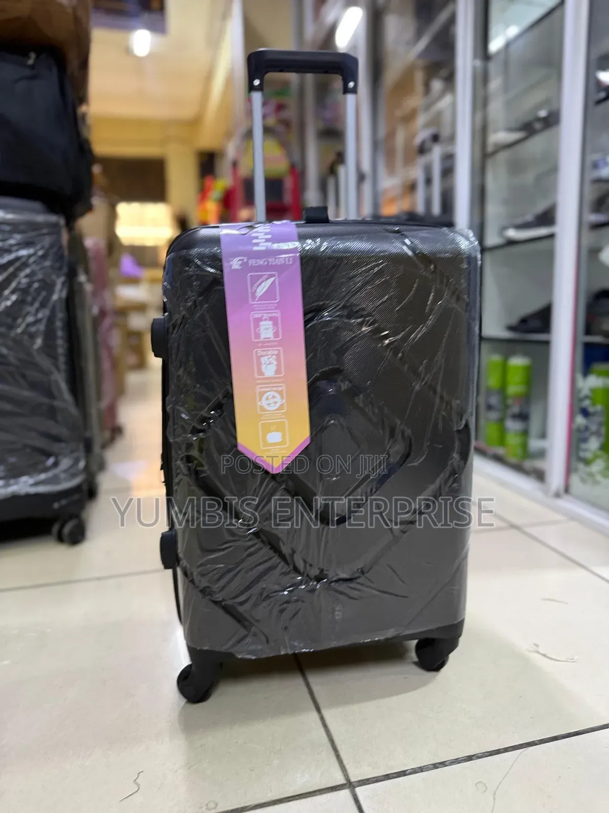 Small Suitcase at 2000. Black Rubber Suitcase
