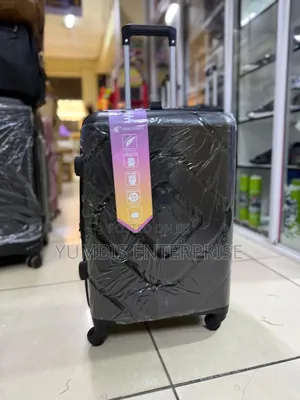 Small Suitcase at 2000. Black Rubber Suitcase