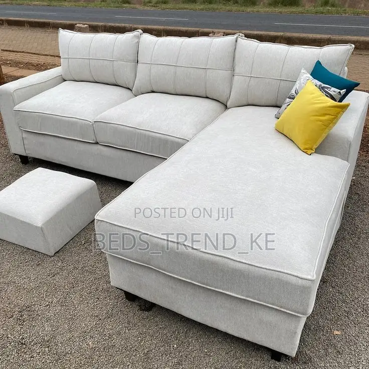 Enhanced 6 Seater L Sofa + a Puff