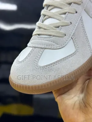 Maison Margiela Replica 
“ Dirty White ”